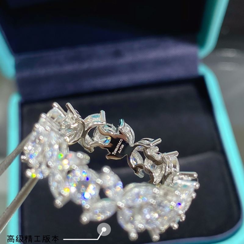 T*f*ny earrings